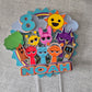 Personalised Colourful Cartoon Cake Topper – Custom Name & Age Birthday Cake Decoration – Rainbow Character Theme